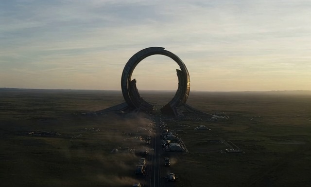 An enormous circular gateway on an alien plain at dawn, generated by EVOKE Turbo